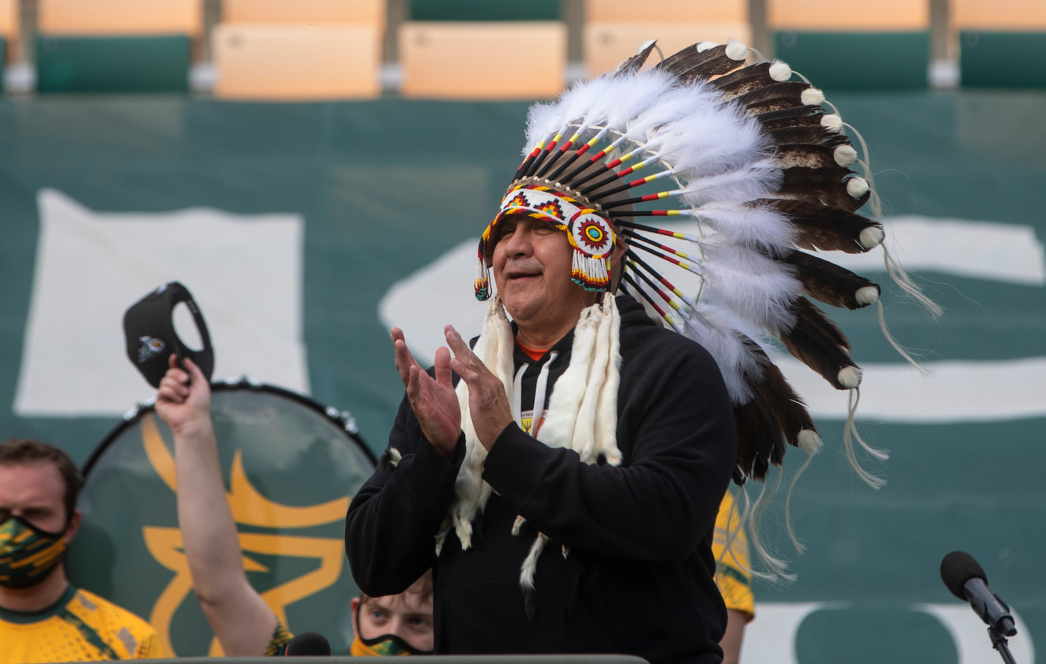 Chief Randy Ermineskin, of the Ermineskin Cree Nation in Alberta, offers a prayer before an Edmonton Elks game.