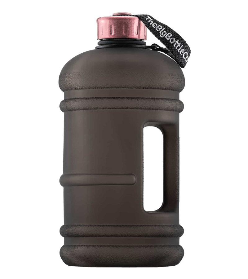 A large brown water bottle with a pink lid