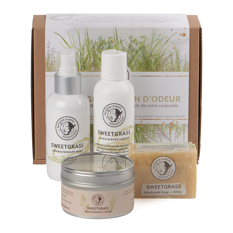 A four-piece gift set from Mother Earth Essentials featuring soap, mist, lotion and a candle 