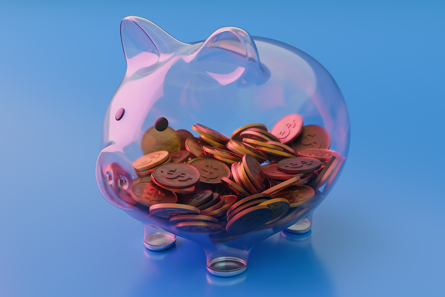 A photo of a clear piggy bank with coins inside