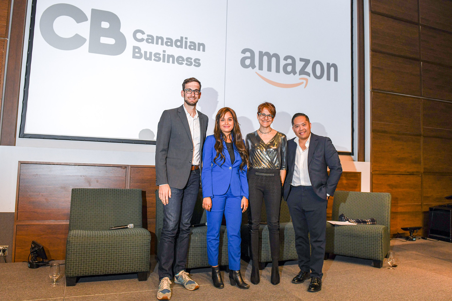 A photo of panelists at a Canadian Business and Amazon Canada event standing on stage