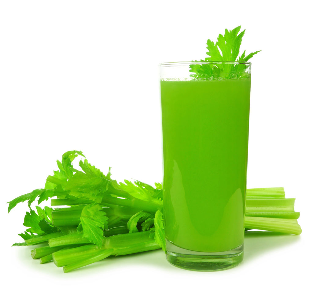 Green celery juice in a glass